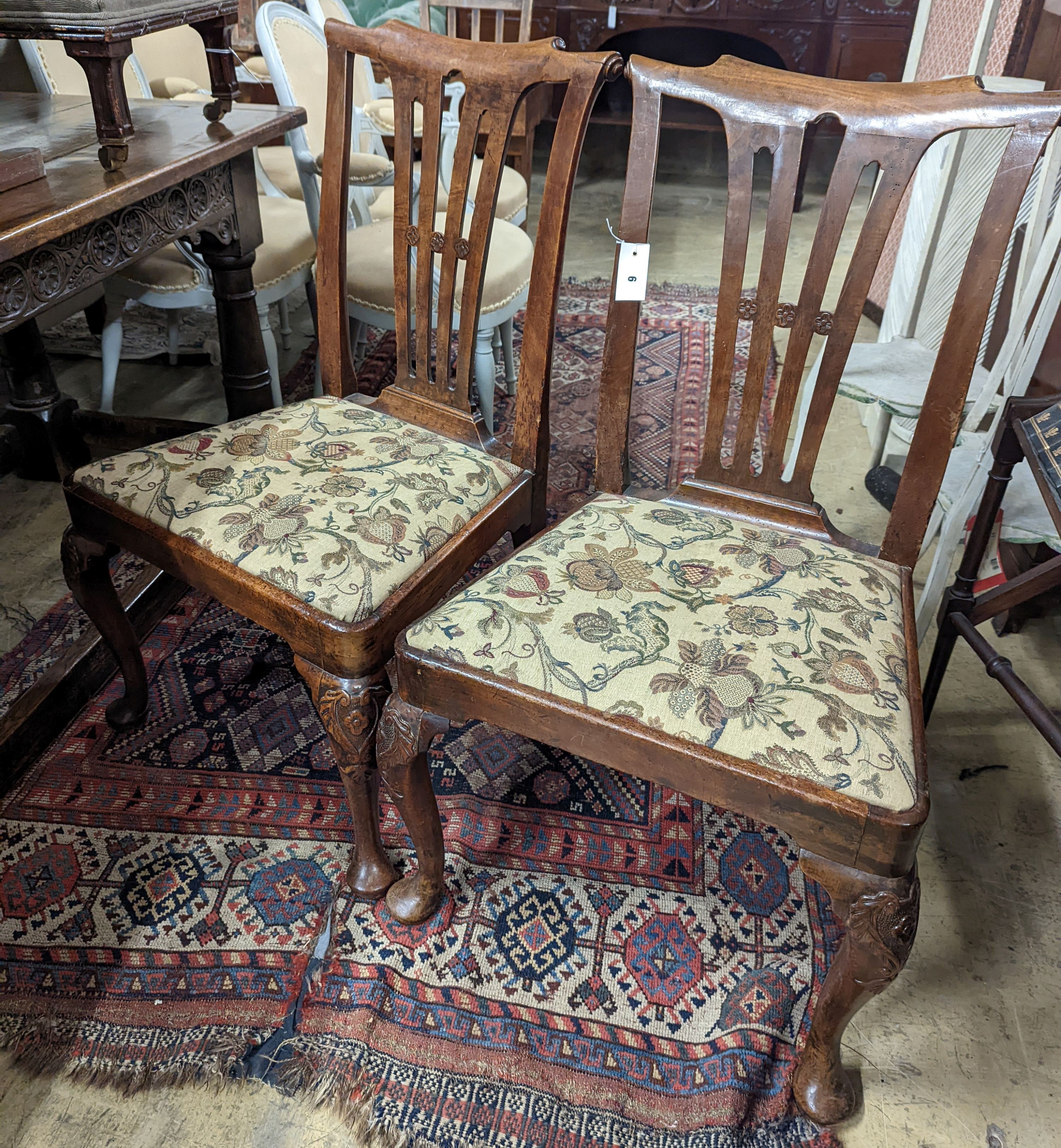 A pair of mid 18th century mahogany dining chairs